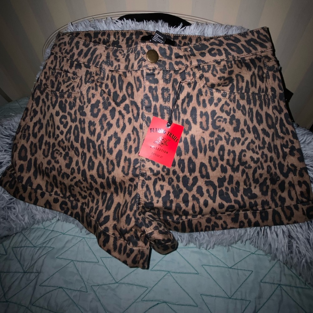 Cheetah print high waisted Forever21 shorts.